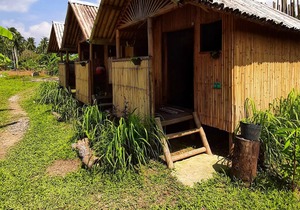 New Bamboo Chalets. Private rooms at hostel prices. Close to beach and town.