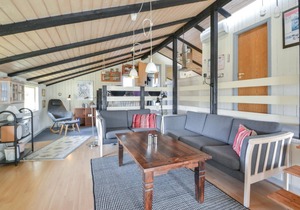 On an attractive dune plot in Rindby lies this well-maintained, beautiful summer house, which is exc