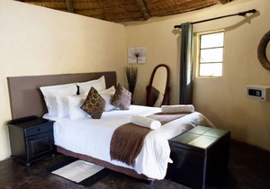 The Queen-Size-Bed Riverside Huts