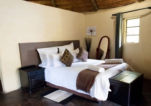 The Queen-Size-Bed Riverside Huts