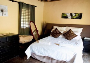 The Queen-Size-Bed Riverside Huts