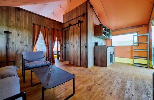 Klavdiyevo-Tarasove Apartment | Апартаменти Тоскана в Сімейному Екопарку Ясногородка