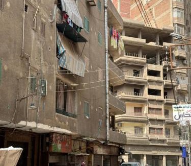 Mansoura Apartment | غرفه خاصه لك جديده وفرش جديد ومميز بها سريرين وتلفزيون