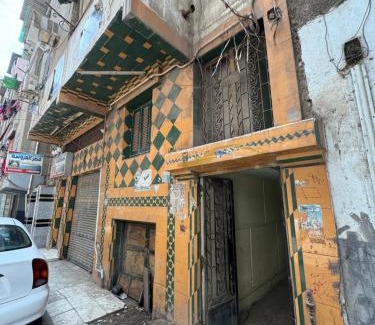 Mansoura Apartment | غرفه خاصه لك جديده وفرش جديد ومميز بها سريرين وتلفزيون