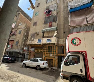 Mansoura Apartment | غرفه خاصه لك جديده وفرش جديد ومميز بها سريرين وتلفزيون