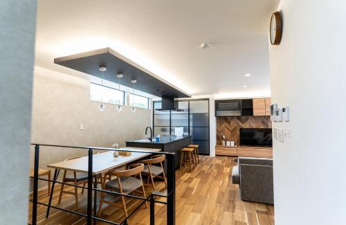 Nishi Ward Apartment | みらいステイKAWACHI サウナspaや温泉付き-絶景オーシャンビューを満喫