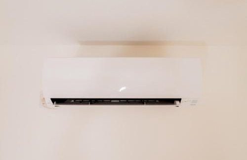 Tsuruhashi Villa | 家族で楽しめる大きなお風呂 ハンモック プロジェクター 寝室5つ バスルーム3つ