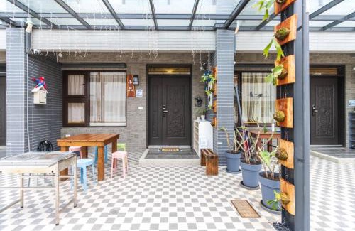 Wujie Apartment | 小品包棟民宿4-18人一一近傳藝親水公園羅東夜市