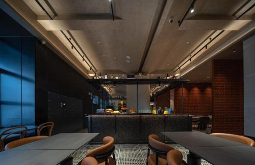 Erqi Square Hotel | 欢桔酒店 郑州二七广场丹尼斯大卫城店