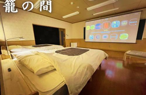 Nagahama Hotel | 鈴籠城 籠の間 ダブルベッド2台 二段ベッド1台