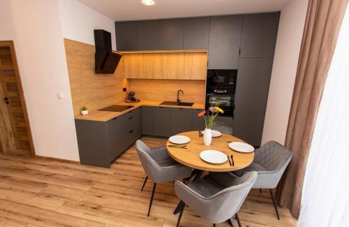 Spisska Nova Ves Apartment | 1-Bedroom LUX Apartment with Balcony & Underground Parking Garage