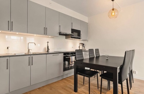 Arstad Apartment | 1 minute to tram! Newly built w/balcony & 3 beds