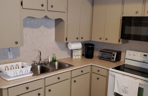 Spanish Wells Apartment | 100ft from the most beautiful beach and crystal clear water, with free golf cart