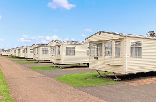 Wigton House | 12ft-wide caravan with one double and two twin.