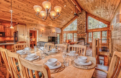 Oregon Water Wonderland Cabin | 17166 Crane Drive is a custom built log cabin on the Big Deschutes River, wit