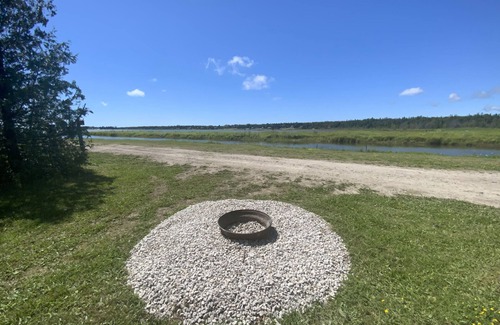 Stokes Bay House | #21 Rivers Edge; sunset waterfront view