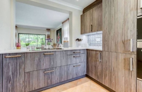 Estombar House | 2bedroom 2en suite Bungalow private Terrace and garden BBQ shared heated pool