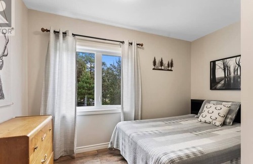 Madawaska Valley Cottage | 3 bedroom open concept Lake front house with shallow entry, sandy bottom beach