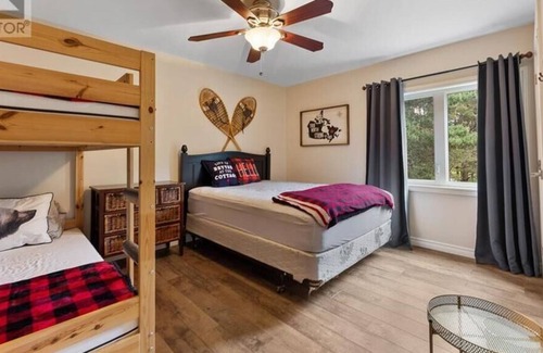 Madawaska Valley Cottage | 3 bedroom open concept Lake front house with shallow entry, sandy bottom beach