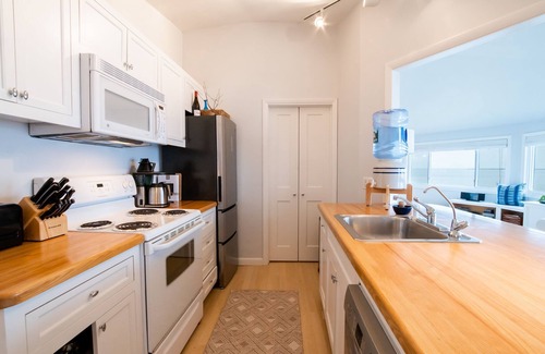 Pocomo House | 360 Waterfront Views with Private Beach in Pocomo!