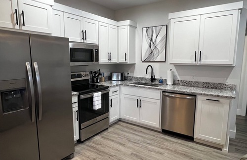 Joplin House | 3BR, 2BA Guest Suite, Pool, Theatre Room, Hot Tub, Brand New!