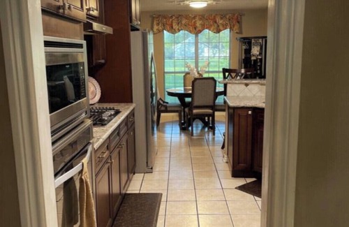 Port Arthur House | 4- Bedroom Serenity: 7 Beds Your Peaceful Retreat: Television in Every Bedroom