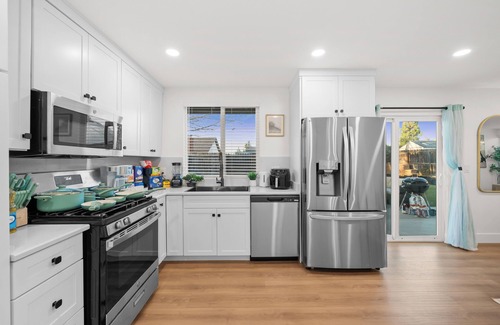 El Cajon House | 4BR/2Bth, Hot Tub, King Bed, Garage, Gated Backyard