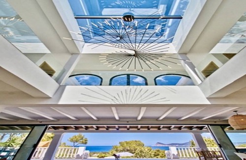 Cala Comte Villa | 5* villa. Superb sea view. Heated swimming pool. Beach 15 mins walk.