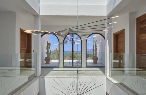 Cala Comte Villa | 5* villa. Superb sea view. Heated swimming pool. Beach 15 mins walk.