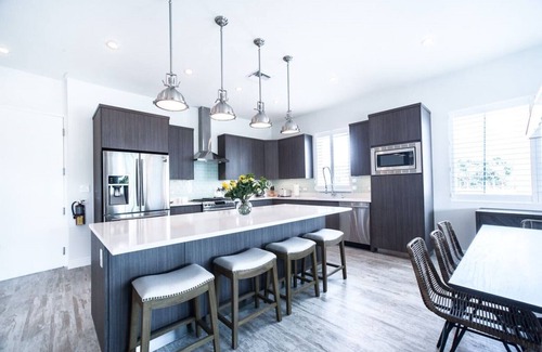 West Bay Condo | 7 Mile Beach views from the Roof terrace. Luxury Condo with Private Beach Club