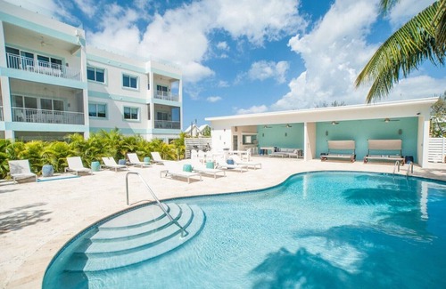 West Bay Condo | 7 Mile Beach views from the Roof terrace. Luxury Condo with Private Beach Club