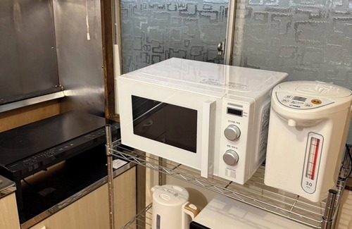 Beppu House | 9 min. walk from Beppu Station/Rental of an old reclaimed house/Max. 6 people/Inn where you can spend a special time with one-of-a-kind vessels and furniture/Free Wi-Fi