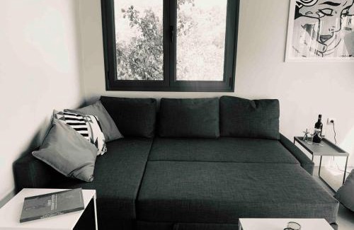 Archangelos Apartment | A designed loft studio a minute walk to the beach