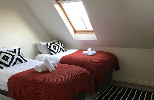 Dalry Apartment | A spacious 4-bedroom duplex apartment. Sleeps 10.