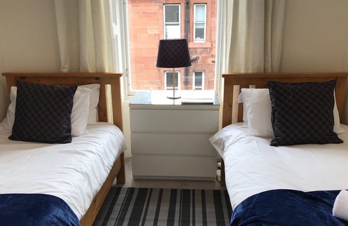 Dalry Apartment | A spacious 4-bedroom duplex apartment. Sleeps 10.