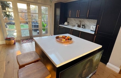 Chiswick Riverside House | A sun-kissed, cozy family home.