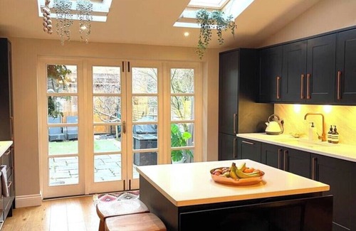 Chiswick Riverside House | A sun-kissed, cozy family home.