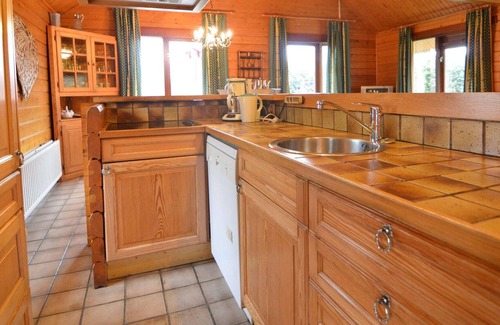 Ovifat Ski Chalet | A wooden chalet located in a quiet and green