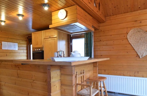 Ovifat Ski Chalet | A wooden chalet located in a quiet and green