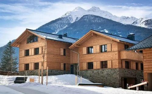 Matrei in Osttirol Apartment | AlpinPark Chalet mit Swimmingpool, Sonnenloggia und Kamin - Großglockner Resort Matrei