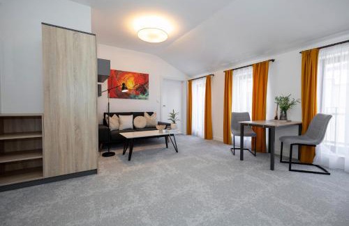 Banska Bystrica Apartment | ALURE RESIDENCES 11 - 24h self check-in & private parking next to the apartment building included, CITY CENTER right on SNP Square in a quiet passage, new building, best deal in town
