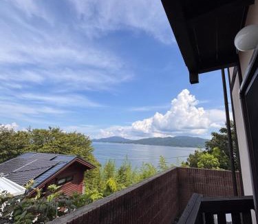 Amakusa House | Amakusa Log House with Sea and Sunset View