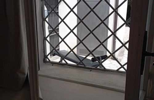 Sessa Aurunca House | An 18th century "manger" overlooking an ancient Roman Bridge.