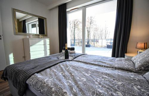 Ostroda Apartment | Apartament VILLA PARK przy plaży z widokiem na jezioro, taras 50 m2