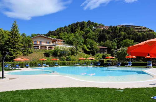 Campi Condo | Apartement with pool and balcony with side lake view