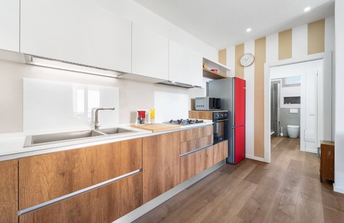 Guspini Apartment | Apartment '4 Seasons' with Balcony, Wi-Fi and Air Conditioning