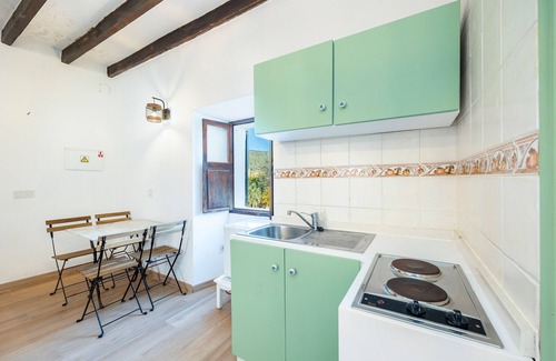 Puigpunyent Apartment | Apartment 'Apartamento' with Mountain View, Shared Pool and Wi-Fi