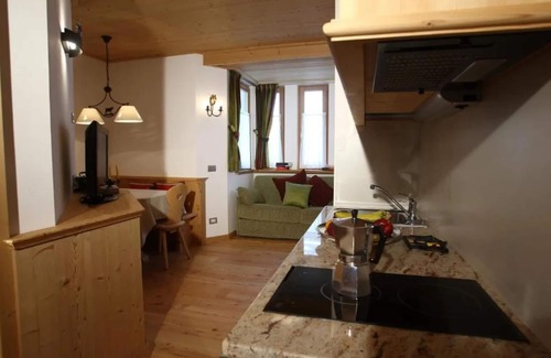 Rocca Pietore Apartment | Apartment 'Appartamento Bilo 4 - Ombretta' with Mountain View, Shared Garden and Wi-Fi