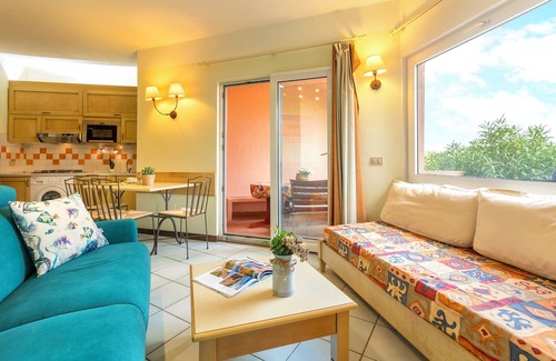 Canneddi Apartment | Apartment 'Costarossa 2208' with Sea View, Private Terrace and Air Conditioning