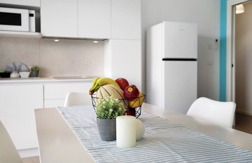 Lido di Jesolo Apartment | Apartment 'Deluxe 7' with Shared Garden, Wi-Fi and Air Conditioning